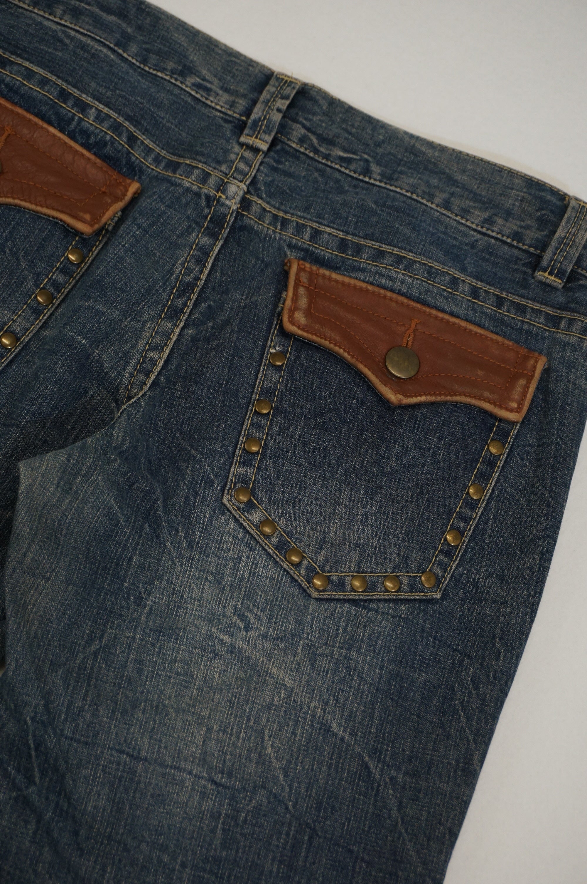 (34") OZZ-FIRST Leather Patch Studded Denim Pants